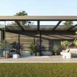 Moderne tuinkamer in een tuin met tips voor het voorjaar en tuinmeubels